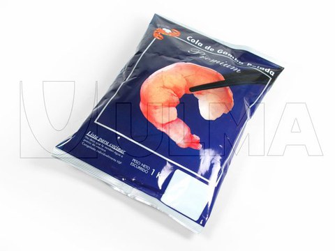 Ganba izoztuak kuxin-poltsan eta film xaflatuarekin ontziratzea. Ganba izoztuak kuxin-poltsan eta film xaflatuarekin ontziratzea.